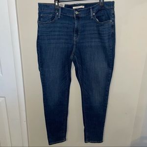 Levi’s 711 Skinny mid rise medium wash jeans 18